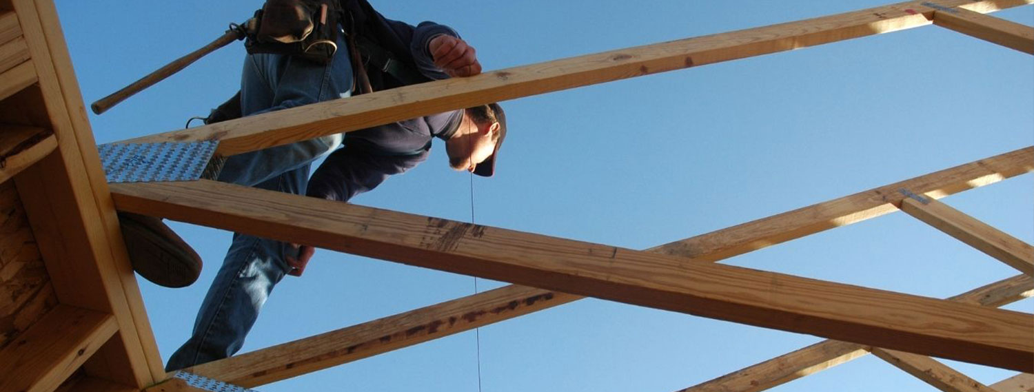 A man working on a new house.